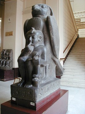 Statue of Hauron protecting Ramesses II as a child